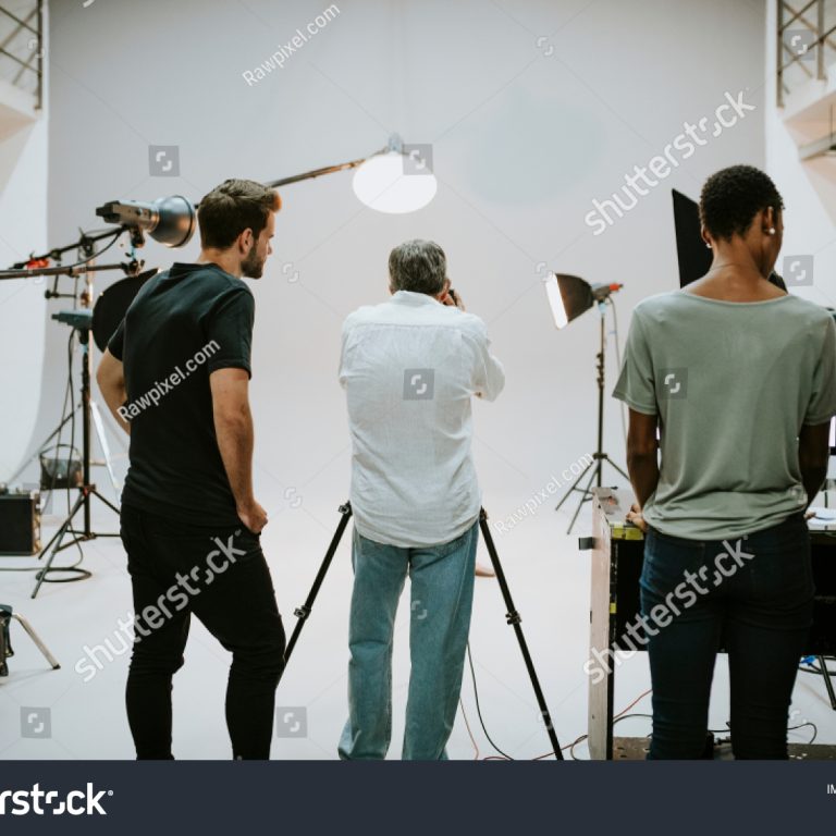 stock-photo-artist-in-the-studio-with-lighting-equipment-1240371127