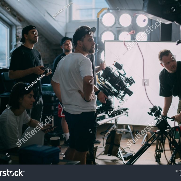 stock-photo-director-at-work-on-the-set-the-director-works-with-a-group-or-with-a-playback-while-filming-a-2231811301