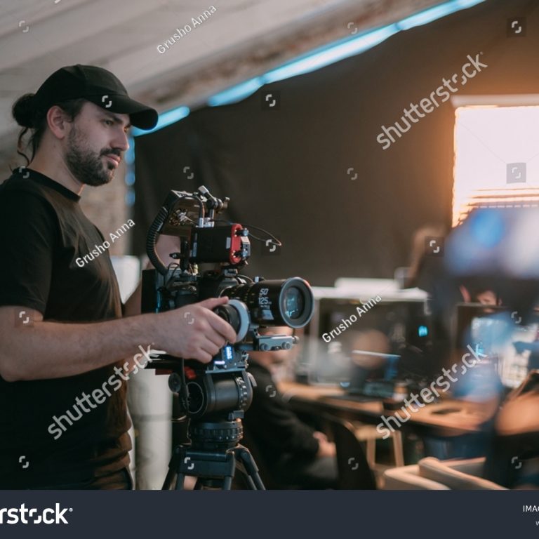 stock-photo-director-of-photography-with-a-camera-in-his-hands-on-the-set-professional-videographer-at-work-on-2285238455